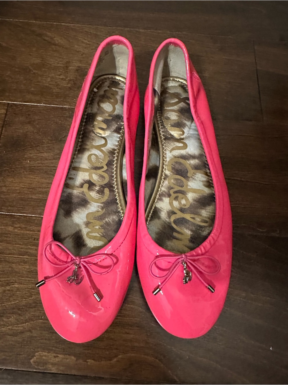 Felicias Neon Pink Patent Ballet Flats with Bow Detail